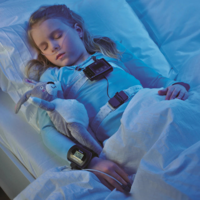 Little girl sleeping with Nox T3 Portable Sleep Monitor for Home Sleep Testing