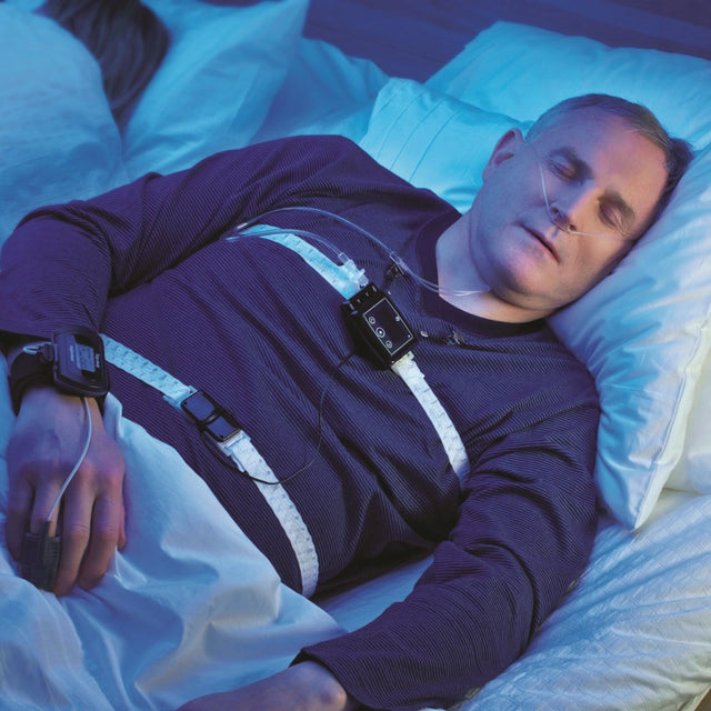 Man sleeping with Nox T3 Portable Sleep Monitor for Home Sleep Testing