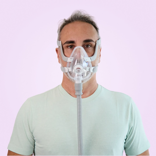 Man wearing a ResMed AirFit™ F20 Full-Face CPAP Mask