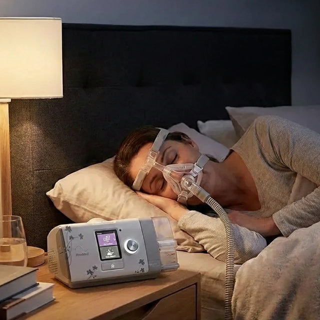 Sleeping woman, using ResMed AirSense 10 Autoset For Her CPAP machine