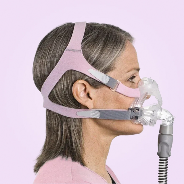 Side view of a woman wearing ResMed AirFit™ F10 For Her Full Face Mask