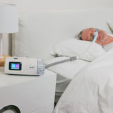 Man using ResMed AirCurve 11 S BiLevel Device during sleep