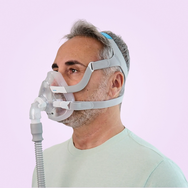 Side view of a man wearing a ResMed AirFit™ F20 Full-Face CPAP Mask