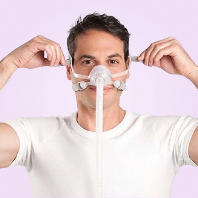 Man wearing ResMed AirFit N10 Nasal CPAP Mask