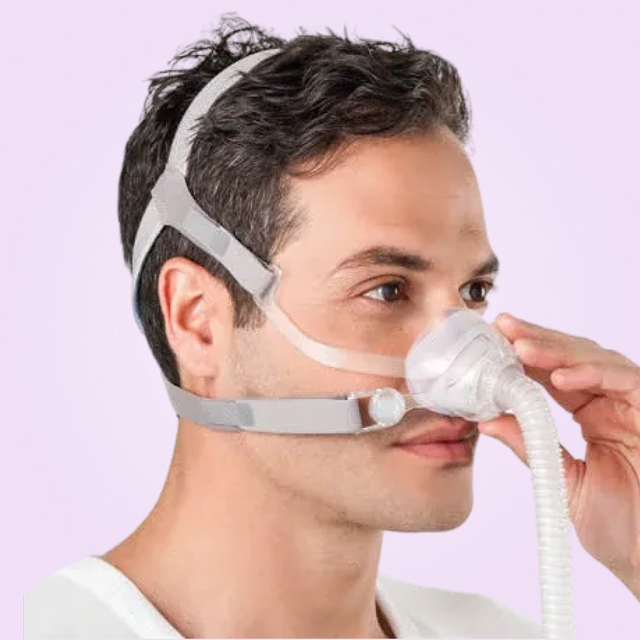 Man adjusting his ResMed AirFit N10 Nasal CPAP Mask