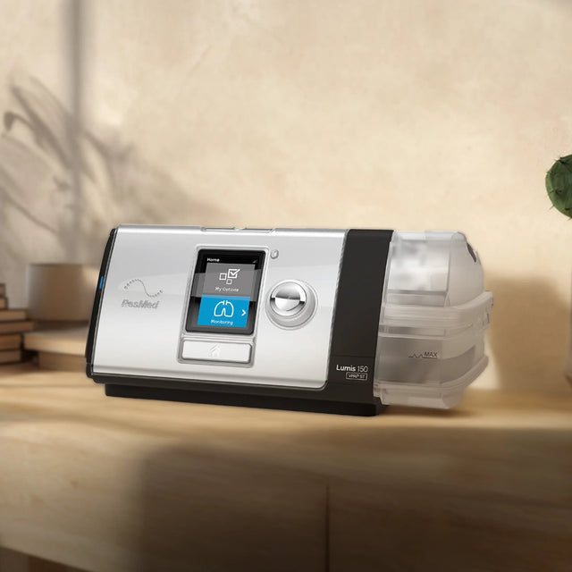 ResMed Lumis 150 VPAP ST Non-Invasive Ventilator on a nightstand
