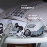 Transcend Auto Travel CPAP Machine on a nightstand next to a CPAP mask