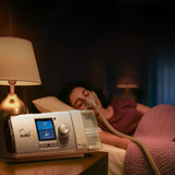 Woman sleeping with ResMed AirCurve 10 VAuto BiLevel Device