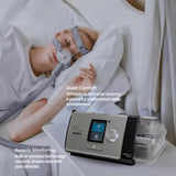Woman sleeping with ResMed Lumis 100 VPAP ST Ventilator